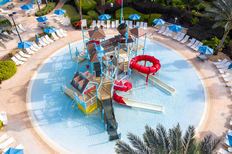 Aquatic playground with water cannons and the tipping bucket, highlighting interactive play for all ages