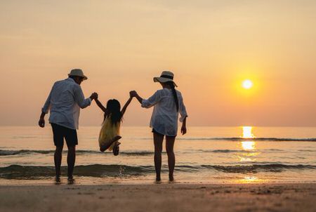 family at the beach west coast vacation homes